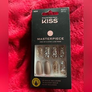 Kiss Press kiss on nails .